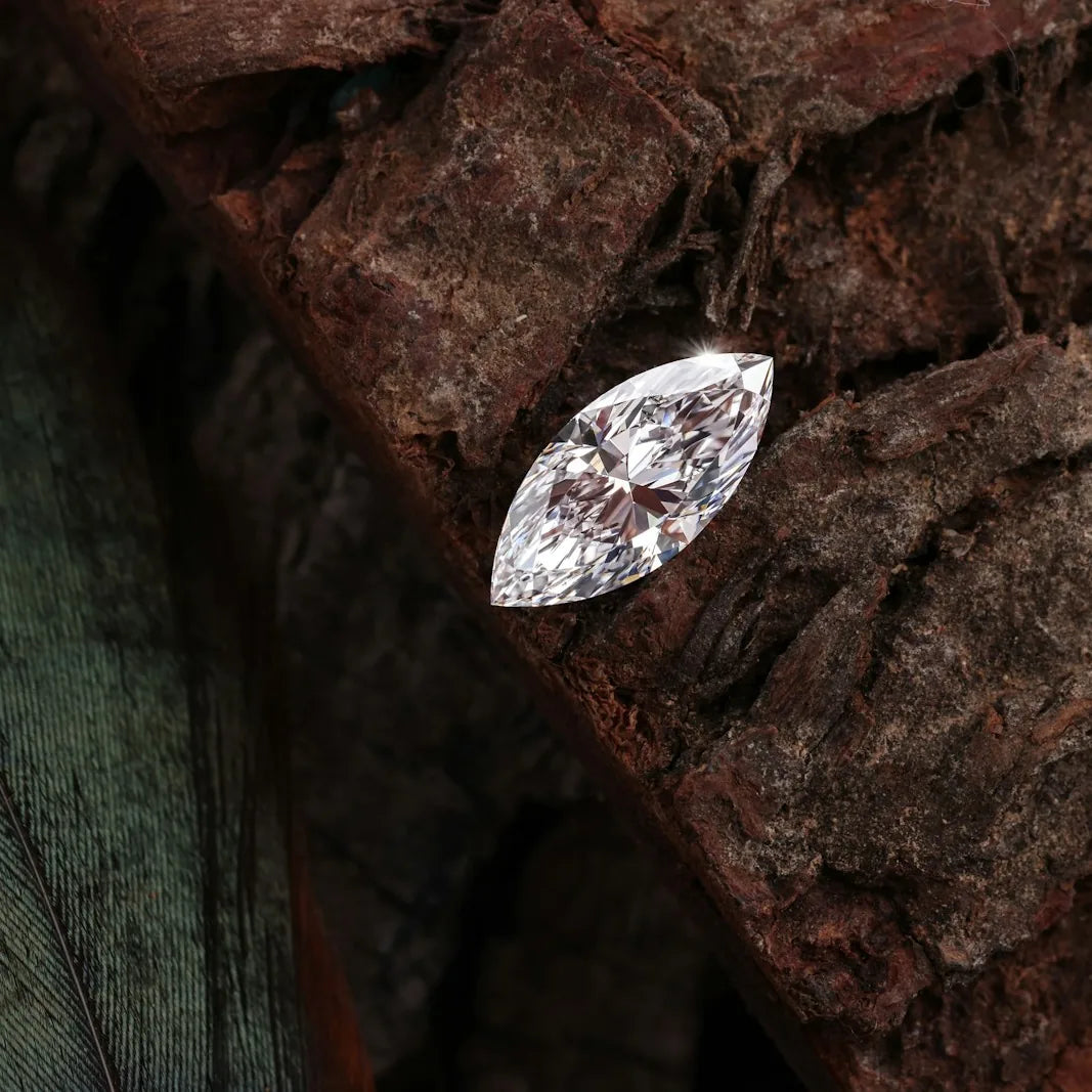 Marquise cut diamond on a textured surface