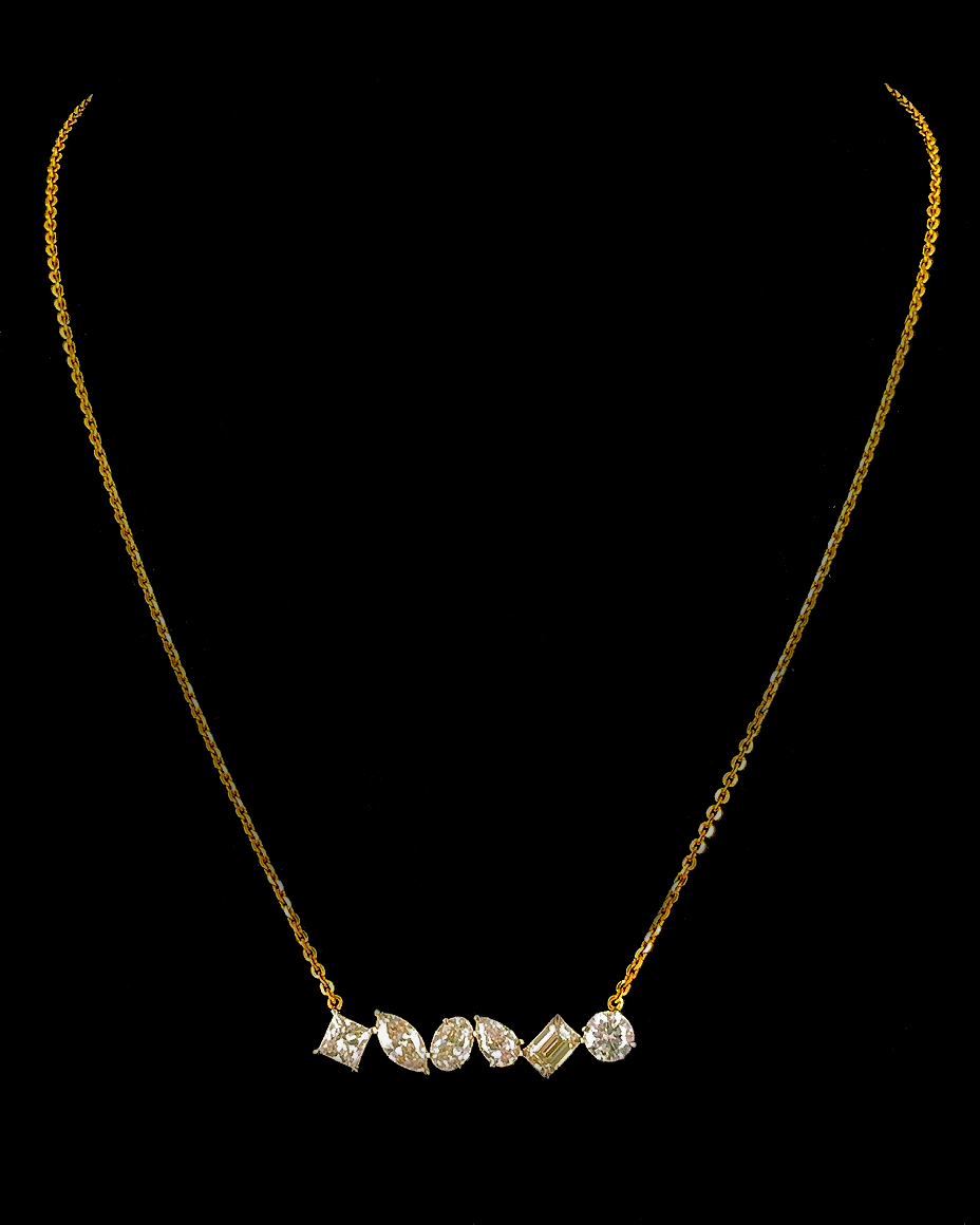 Yellow gold mixed-cut pendant with six round, pear, oval, marquise and emerald lab grown diamonds on black