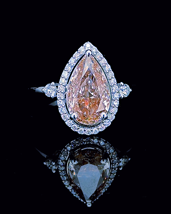 Main: White gold 1.09ct pink pear double halo ring with lab grown diamonds on black
Detail: Close-up of 1.09ct pink pear lab grown diamond framed by a white gold double halo
Side: White gold pear ring showing raised double halo setting and lab grown diamond detailing