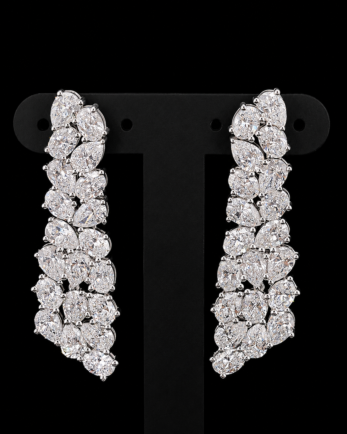 White gold cluster drop earrings with pear and oval lab grown diamonds on black