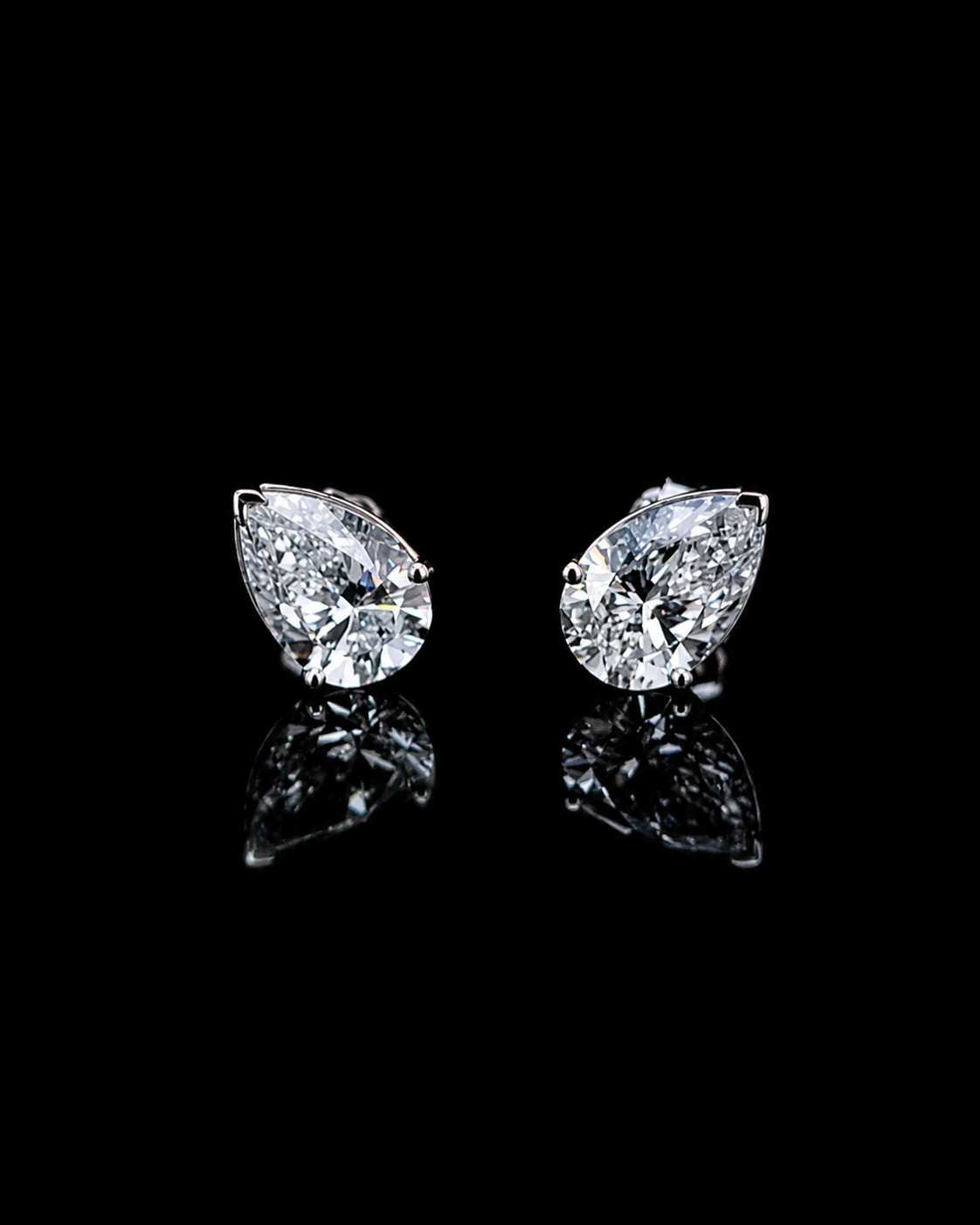 white gold pear solitaire stud earrings with lab grown diamonds