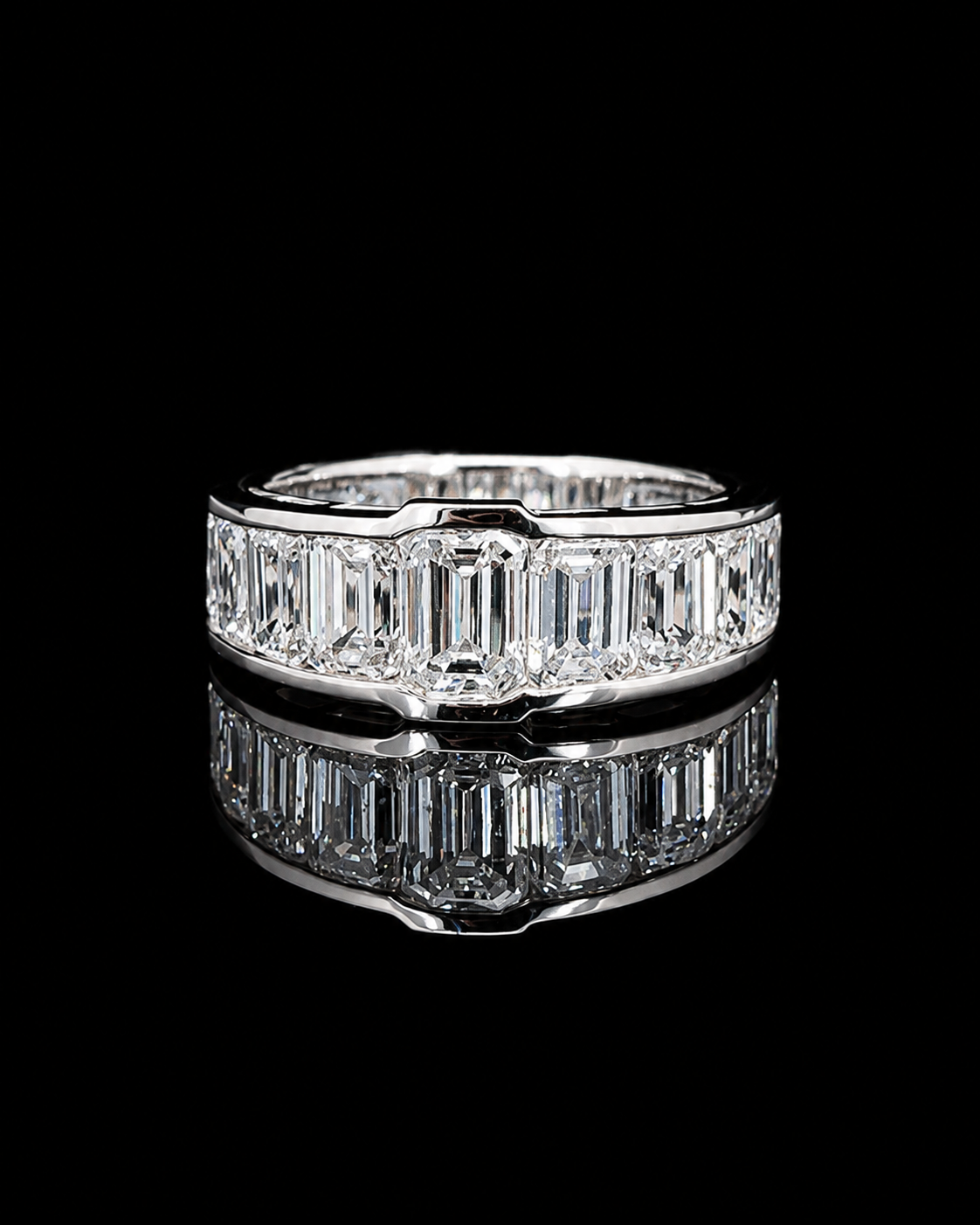 White gold 1.15ct emerald-cut ring with graduated lab grown diamond sides on black