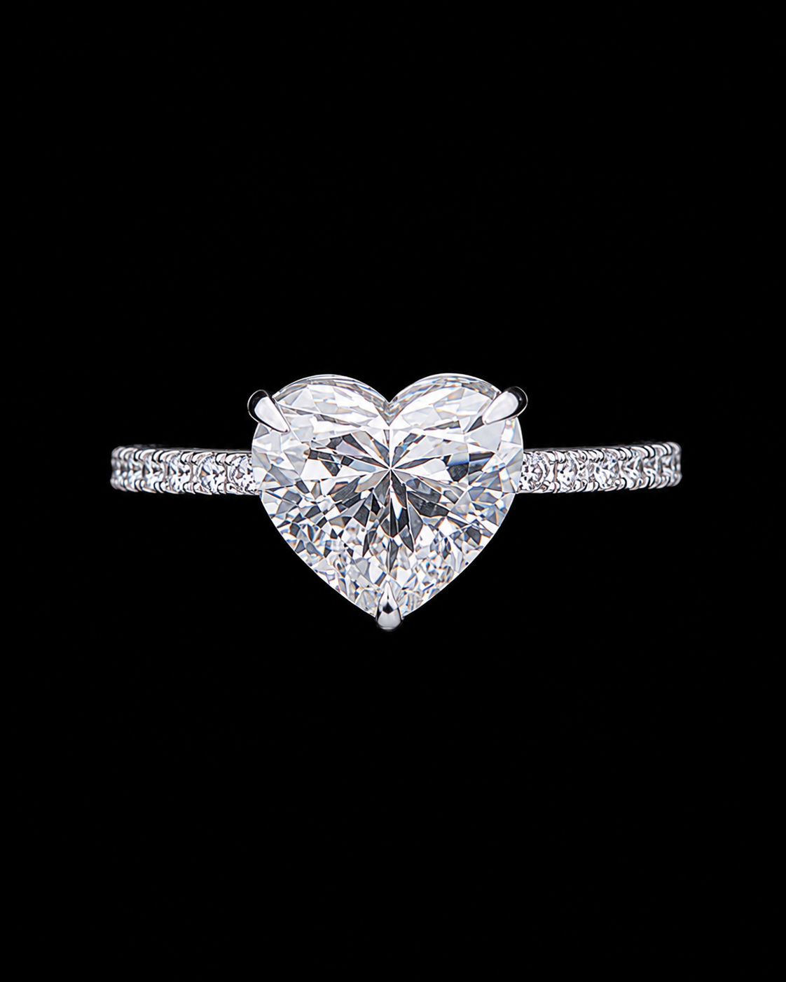 White gold heart solitaire ring with lab grown diamond center and pave shoulders