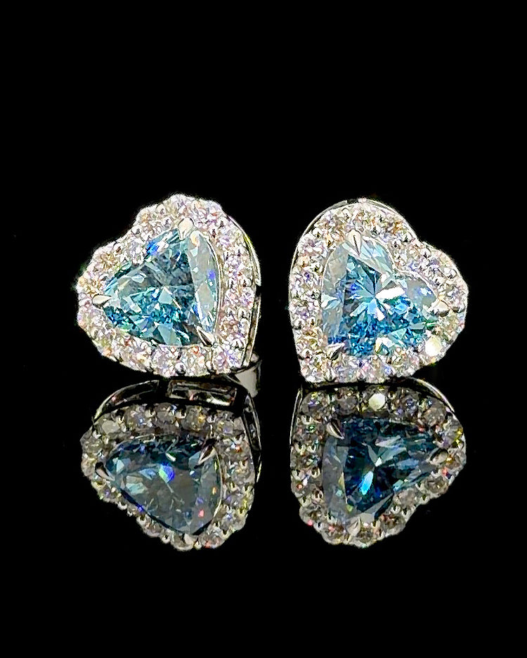 White gold heart halo stud earrings with heart-cut lab grown diamonds on black