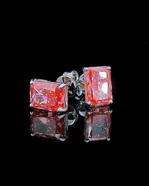White gold pink radiant solitaire stud earrings with 4.39ct total lab grown diamonds on black