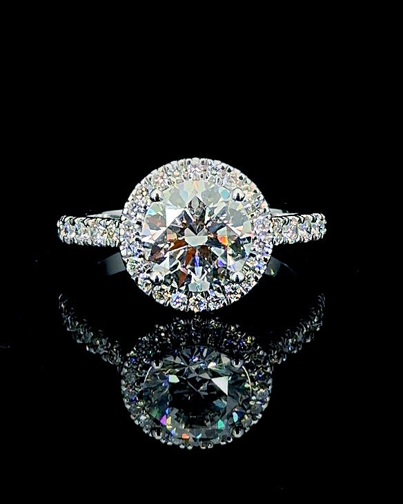 Main: White gold 4.00ct round double halo ring with pave lab grown diamonds on black
Detail: Close-up of 4.00ct round lab grown diamond surrounded by layered white gold diamond halo
Side: White gold round ring showing diamond-set gallery, raised halo and lab grown diamond pave shoulders