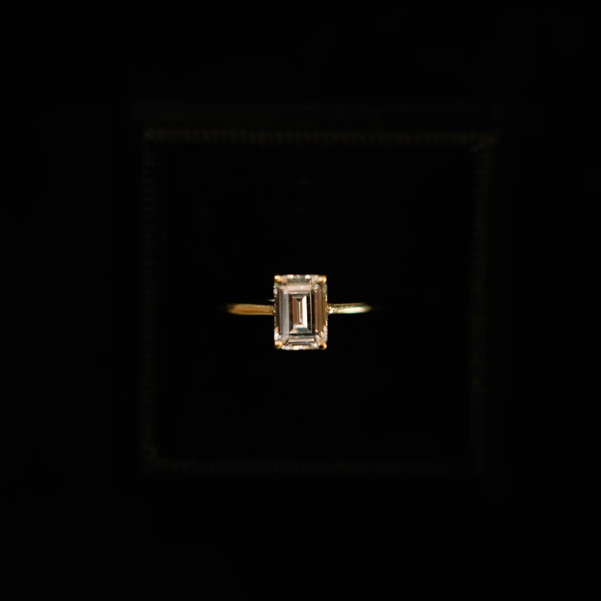 Ring set with a square cut diamond center stone