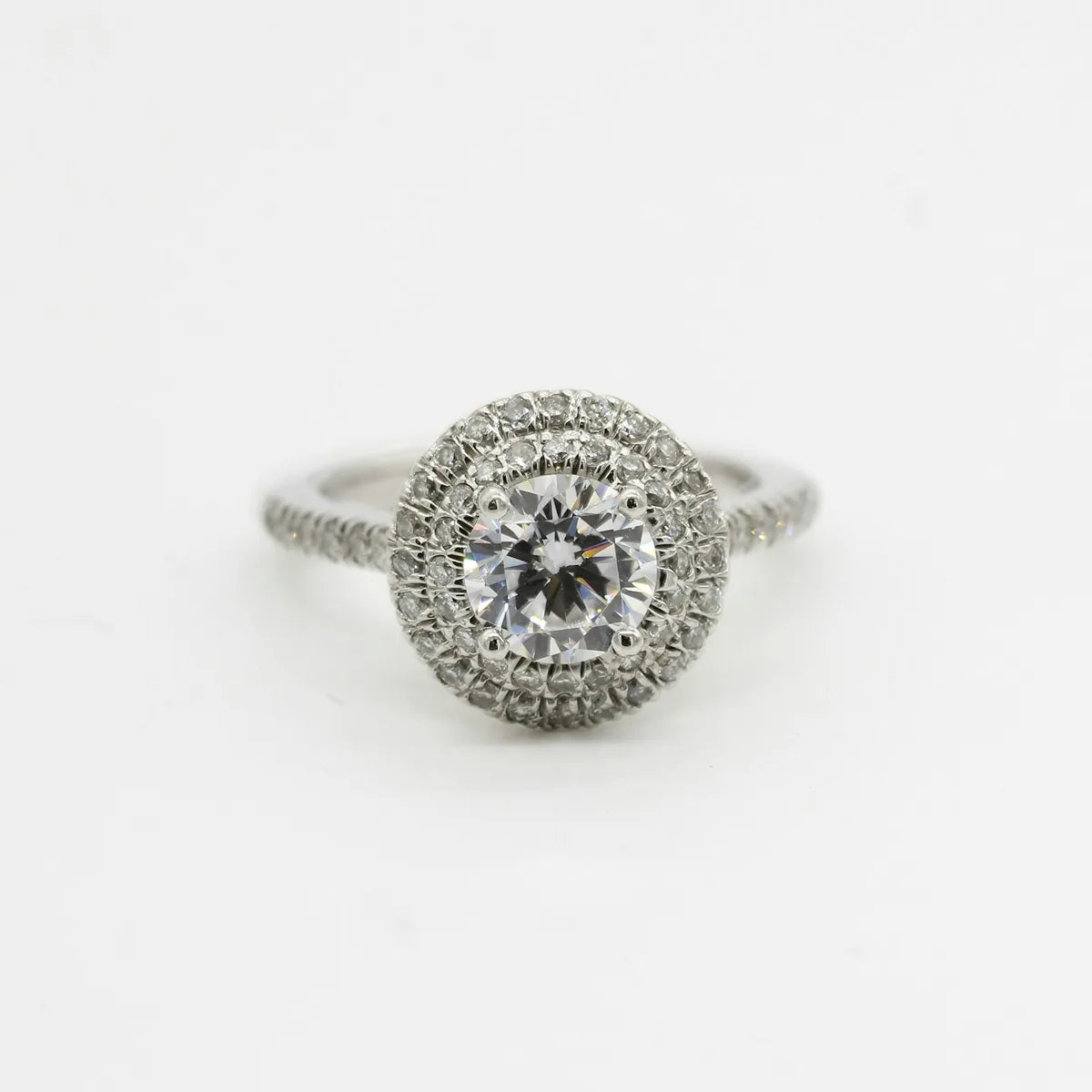 Silver ring set with clear white stones