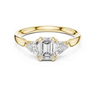 emerald lab grown diamond three stone engagement ring in yellow gold