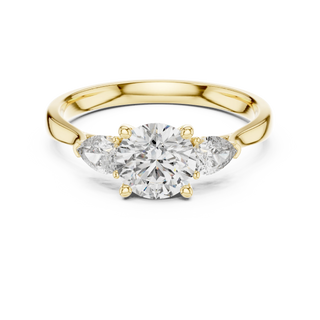 cushion lab grown diamond three stone engagement ring in yellow gold