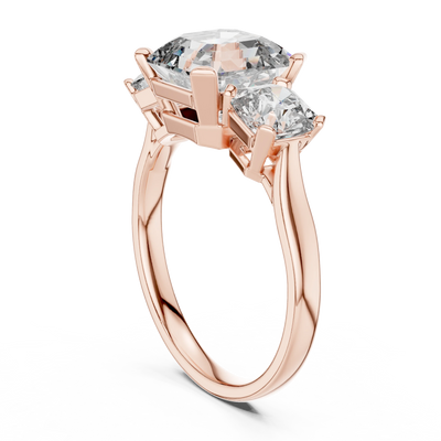 Emerald lab grown diamond three stone ring in rose gold