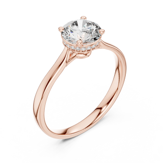 round diamond hidden halo engagement ring in rose gold
