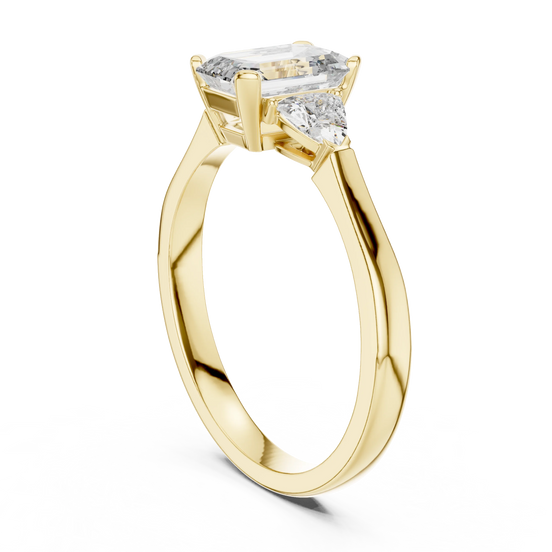 emerald lab grown diamond three stone ring in yellow gold