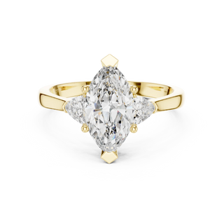 marquise lab grown diamond three stone ring in yellow gold