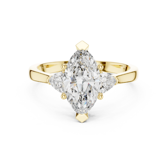marquise lab grown diamond three stone ring in yellow gold