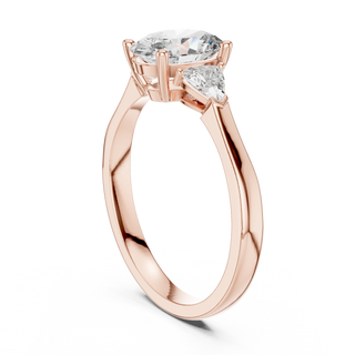oval lab grown diamond three stone ring in rose gold
