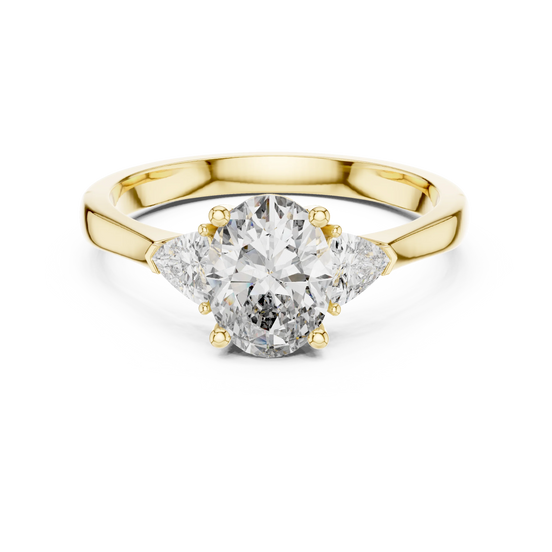 oval lab grown diamond three stone ring in yellow gold