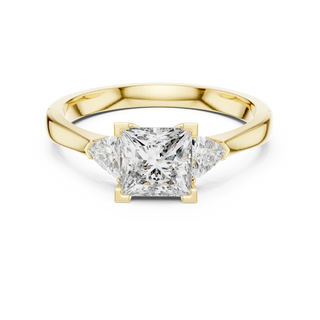 princess lab grown diamond three stone ring in yellow gold