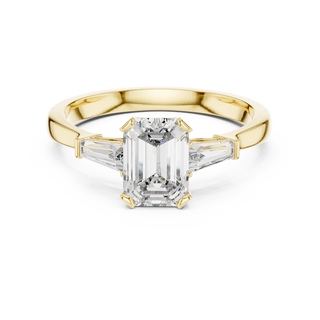 Emerald lab grown diamond three stone ring in yellow gold