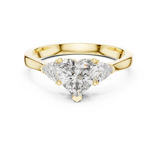 Heart lab grown diamond three stone engagement ring in yellow gold