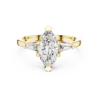 marquise diamond tapered baguette ring in yellow gold
