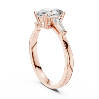 oval diamond tapered baguette ring in rose gold
