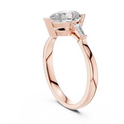 pear diamond tapered baguette ring in rose gold
