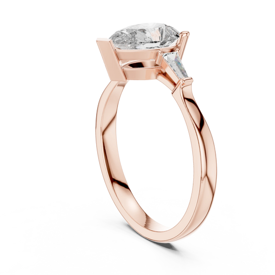 pear diamond tapered baguette ring in rose gold
