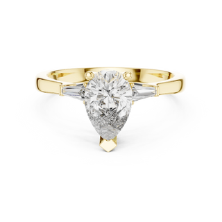 pear diamond tapered baguette ring in yellow gold
