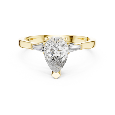 pear diamond tapered baguette ring in yellow gold
