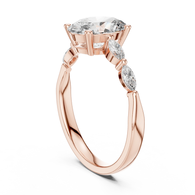 oval diamond marquise side-stone ring in rose gold
