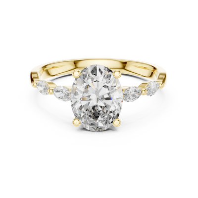 oval diamond marquise side-stone ring in yellow gold
