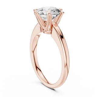 round diamond six-prong cathedral ring in rose gold
