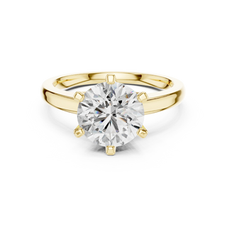 round diamond six-prong cathedral ring in yellow gold
