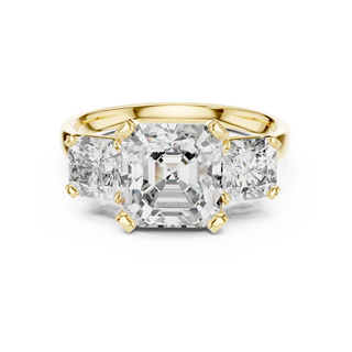 emerald diamond radiant accent ring in yellow gold
