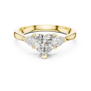 heart diamond trillion three-stone ring in yellow gold
