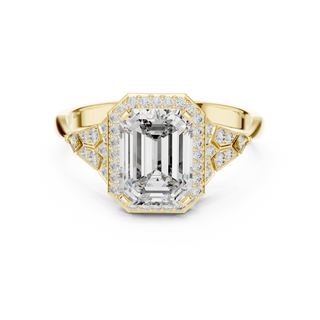 emerald diamond art deco halo engagement ring in yellow gold
