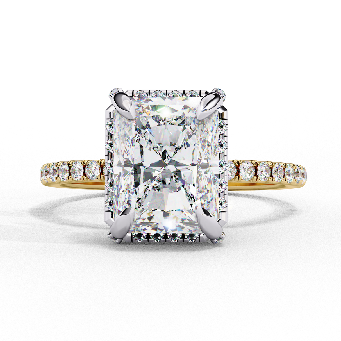 yellow gold radiant cut lab grown diamond engagement ring with a diamond halo and pavé band.