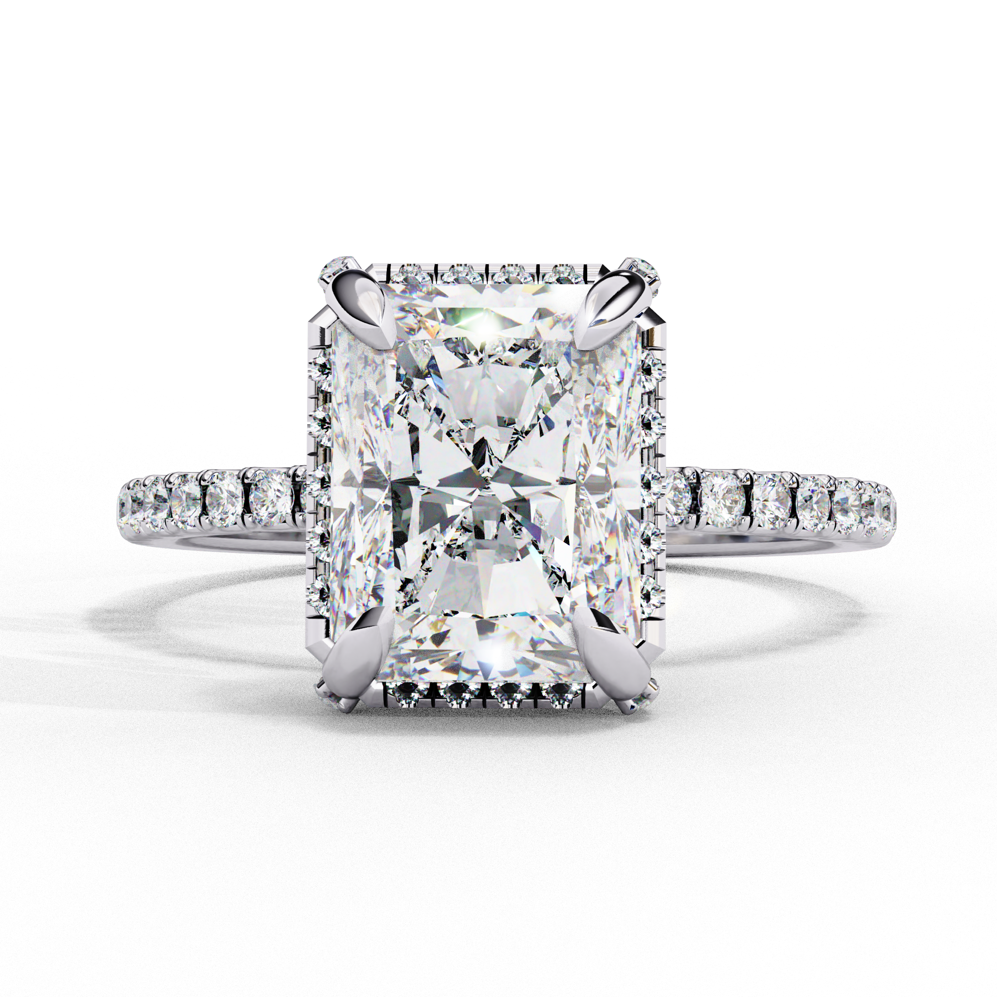 White gold radiant cut lab grown diamond engagement ring with a diamond halo and pavé band.