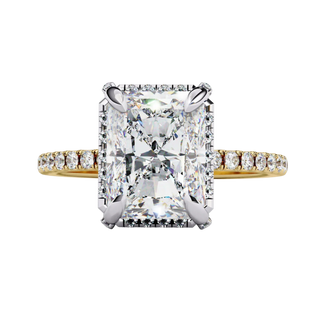 Front view of a radiant cut diamond engagement ring in yellow gold.