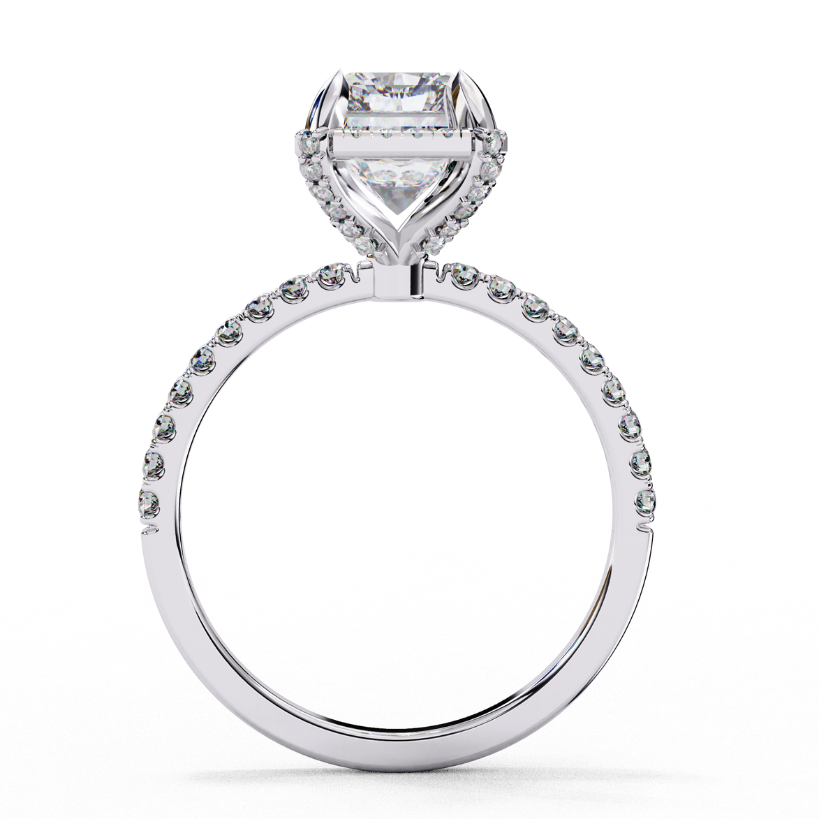 Side profile of a radiant cut lab grown diamond engagement ring with a hidden halo and pavé band in white gold