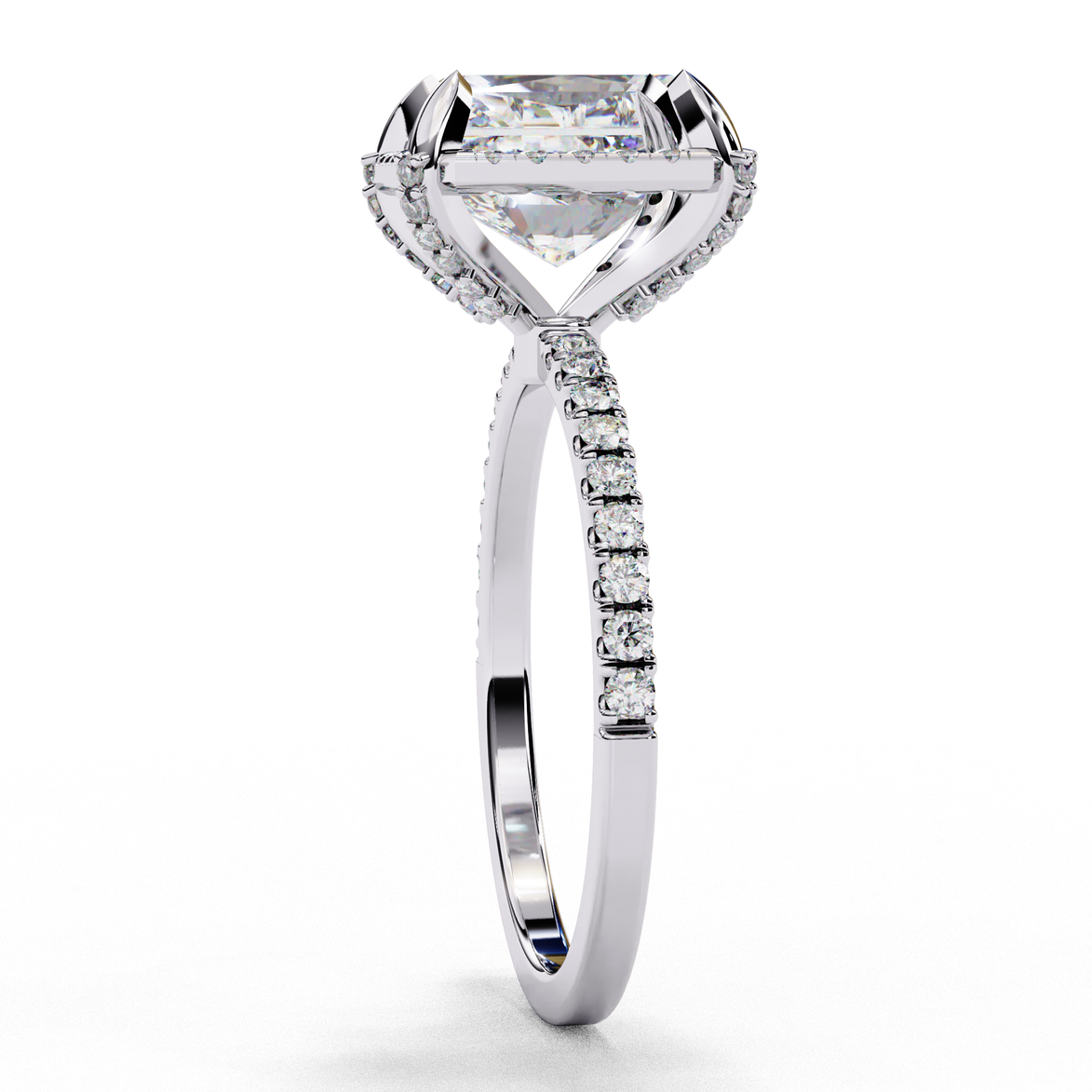 White gold radiant cut lab grown diamond engagement ring with a pavé band shown from a side profile view.