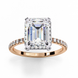 Side profile of a radiant cut lab grown diamond engagement ring with a hidden halo and pavé band in yellow gold.
