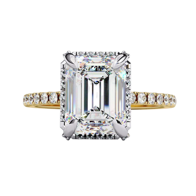Emerald cut diamond engagement ring in yellow gold from a side angle.