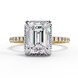 Side profile view of a yellow gold radiant cut lab grown diamond engagement ring with a pavé band.