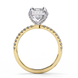 Side profile of a radiant cut lab grown diamond engagement ring with a hidden halo and pavé band in rose gold.