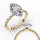 Close-up angled shot of a yellow gold marquise cut lab grown diamond double halo engagement ring.
