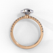 Side profile of a rose gold marquise cut lab grown diamond engagement ring showing the low-profile basket construction.