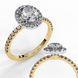 Close-up angled shot of a  yellow gold oval cut diamond halo engagement rings 