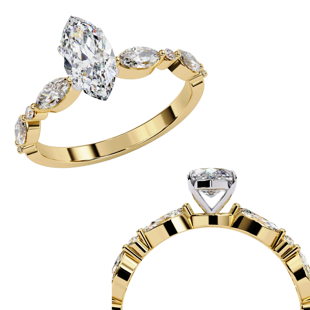 Close-up angled shot of a yellow gold marquise cut diamond engagement rings side by side.
